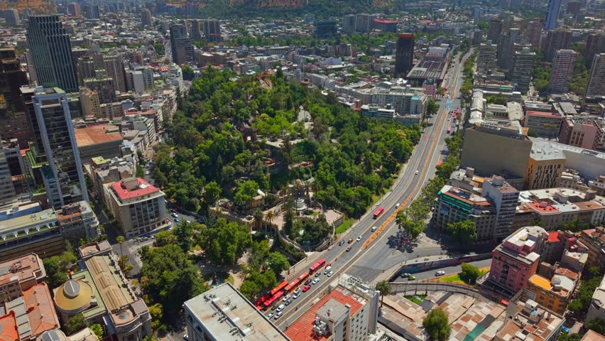 Aerial Establishing fly Downtown Santiago de Chile Traffic, Alameda Avenue and Santa Lucía Hill