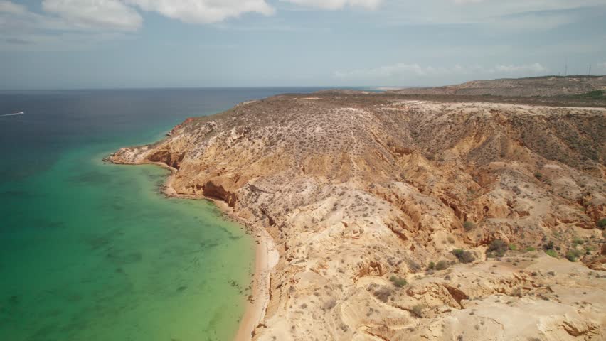 Aerial overflight Araya coastline mountains Venezuela turquoise