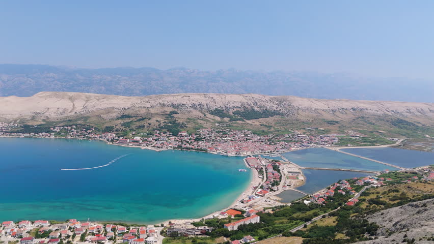 View of a coastal town along the water in Croatia with a beach
