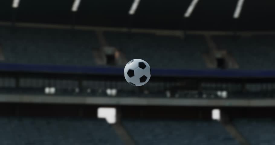 flying soccer ball on stadium

