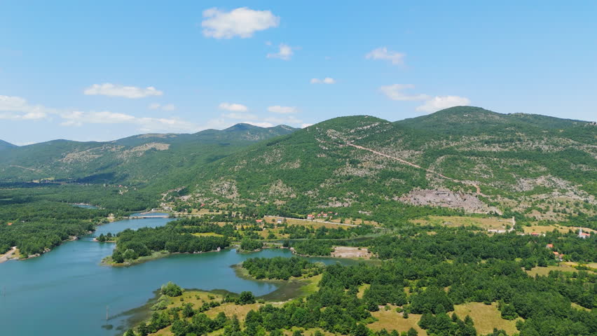 Scenic view of river and mountains from above in summer in the afternoon