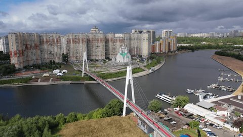 Drone Flying over Pavshinsky Bridge toward Cathedral