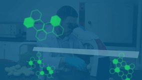 Animation of data processing over caucasian male scientist working in lab. Global science, computing and digital interface concept digitally generated video. - Powered by Shutterstock - Get 15% off with code: PIKWIZARD15