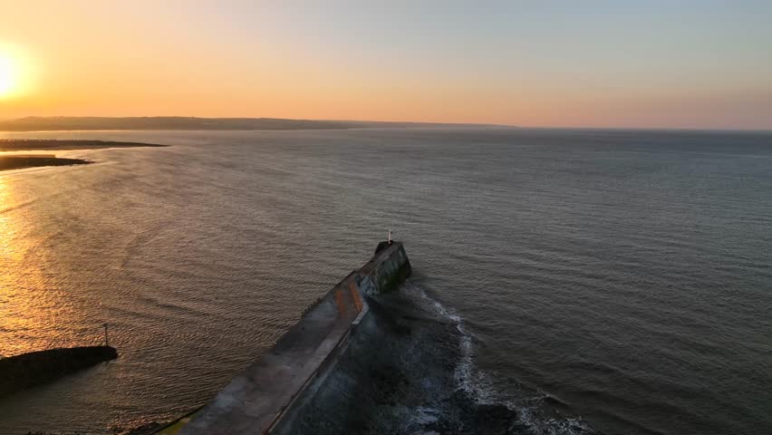 4K drone footage of lighthouse at sunrise
