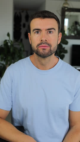 Man listening to something shocking 