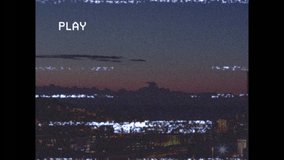 Animation of interference and play text over cityscape. global business and digital interface concept digitally generated video. - Powered by Shutterstock - Get 15% off with code: PIKWIZARD15