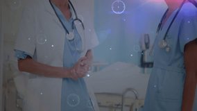 Animation of network of connections over smiling diverse female nurse and doctor talking. global medicine and digital interface concept digitally generated video. - Powered by Shutterstock - Get 15% off with code: PIKWIZARD15