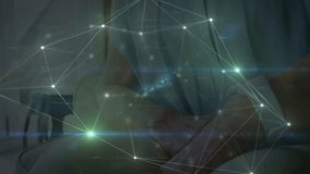 Animation of media icons over caucasian man using smartwatch. global business and digital interface concept digitally generated video. - Powered by Shutterstock - Get 15% off with code: PIKWIZARD15