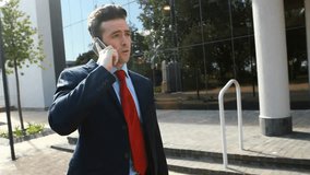 Animation of shapes and globe over caucasian businessman using smartphone. Global business and digital interface concept digitally generated video. - Powered by Shutterstock - Get 15% off with code: PIKWIZARD15