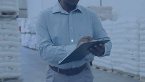 Animation of network of digital icons on male supervisor writing on clipboard at warehouse. Global networking and logistics business technology concept - Powered by Shutterstock - Get 15% off with code: PIKWIZARD15