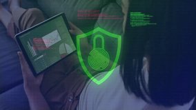 After tapping tablet woman starting security scan with shield icon fading and fingerprint animating. Cybersecurity, digital, technology, interface, protection, authentication, data - Powered by Shutterstock - Get 15% off with code: PIKWIZARD15