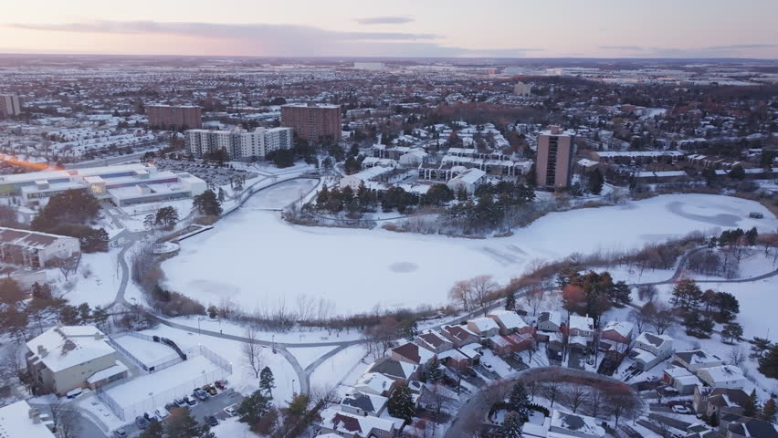 Snowy aerial view of Mississauga, Ontario at winter sunset