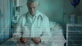 Data processing and grid network over caucasian senior male doctor using digital tablet at hospital. Medical healthcare and technology concept - Powered by Shutterstock - Get 15% off with code: PIKWIZARD15