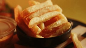 Enjoying hot french fries served in a bowl with smoke in a kitchen setting - Powered by Shutterstock - Get 15% off with code: PIKWIZARD15