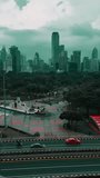 dark dystopian cyberpunk city with gloomy sky and futuristic skyscraper skyline, cars driving road at rush hour, downtown of modern metropolis, Bangkok Thailand, timelapse 4k vertical video - Powered by Shutterstock - Get 15% off with code: PIKWIZARD15