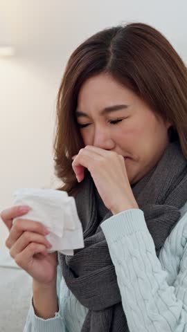 Sick Young Woman Brown Hair Holding Face Severe Flu Symptoms Feeling Unwell Cough Sneeze Pain Headache Temperature Infection Wearing Scarf Winter Clothes Illness Disease Health Vertical Video