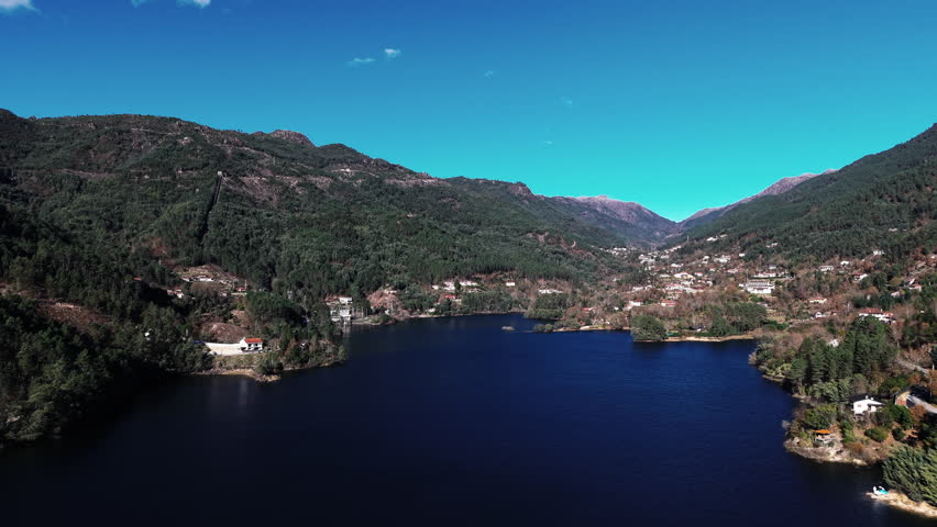 Drone view of Cavado River and surrounding mountains in Terras de Bouro