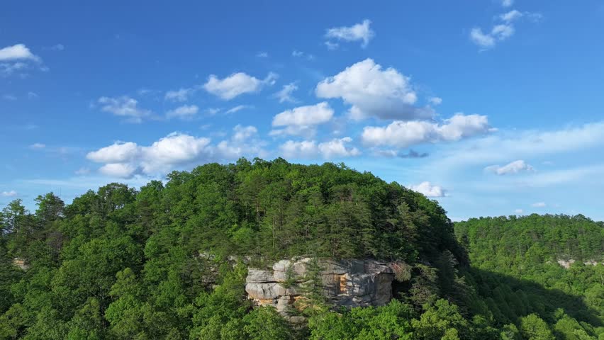Hyperlapse view of lush hills and sky moving over Red River Gorge, Kentucky