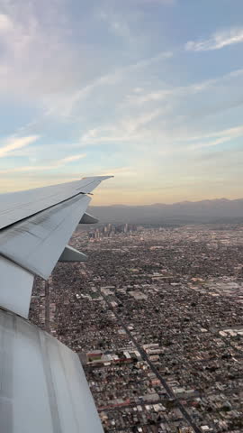 Aerial view of Downtown Los Angeles during late afternoon, highlighting the city
