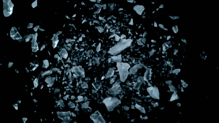 Super Slow Motion of Exploding Ice Shards . Filmed on High Speed Cinema Camera at 1000 FPS