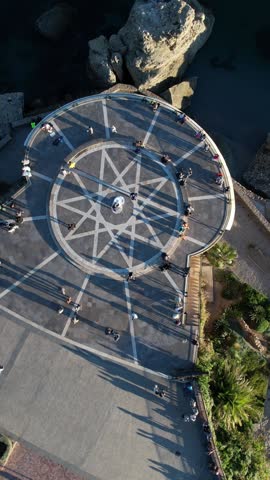 Aerial Perspective of Gibralfaro viewpoint in Malaga Spain capturing tourists and architectural details