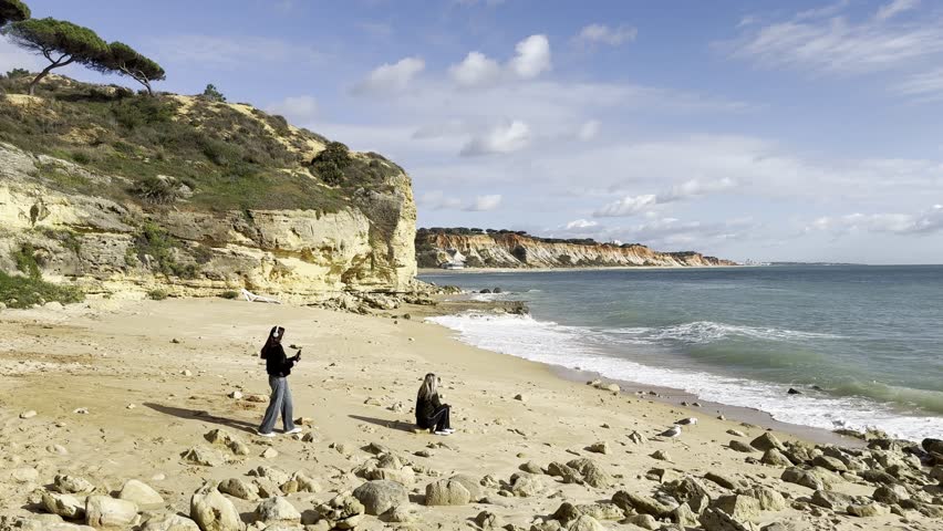 Praia de Olhos de Agua Portugal Algarve Cliffs, Crystal Blue Waters and Charming Coastal Village. Portugal Aerial