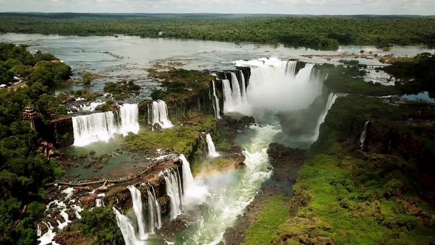 Iguazu Falls in Argentina - Brasil Border is one of the Natural Seven Wonders of the World and an UNESCO World Heritage Site. High quality 4k footage