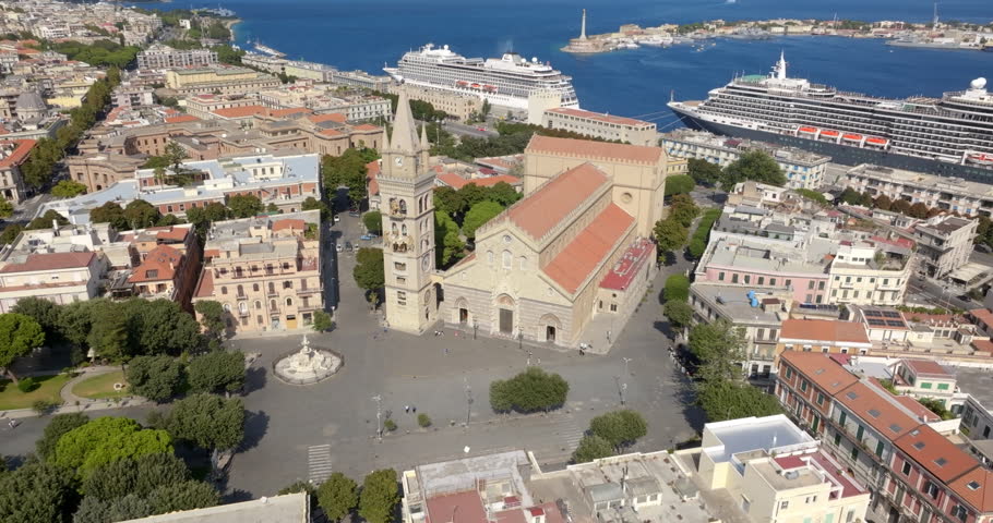 Aerial view of the Metropolitan Cathedral Basilica of Santa Maria Assunta, located in the historic center of Messina, Sicily, Italy. The intricate Romanesque architecture stands out against the square