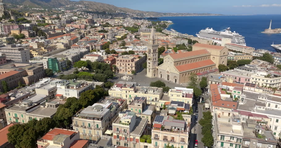 Aerial view of the historic center of Messina, South Italy. It is a coastal town overlooking the Strait of Sicily. At the center of the city is the Metropolitan Cathedral Basilica Santa Maria Assunta.