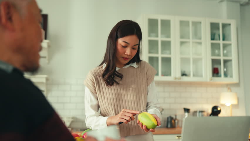 mother day family relation bonding at home asian family mother father and daughter enjoy cuddle conversation morning lifestyle hapiness joyful moment while stay at kitchen area home love bonding