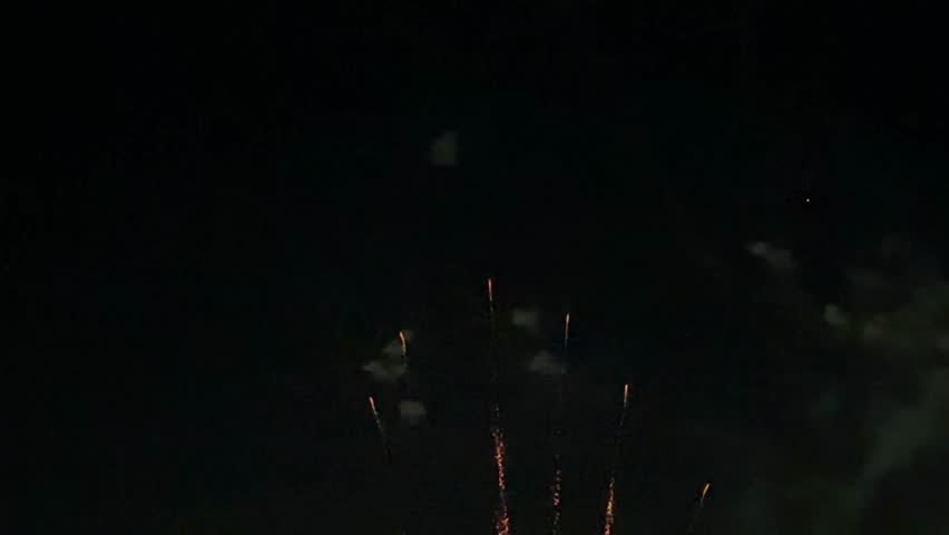 Fireworks light up the night sky with explosive beauty and color.New year