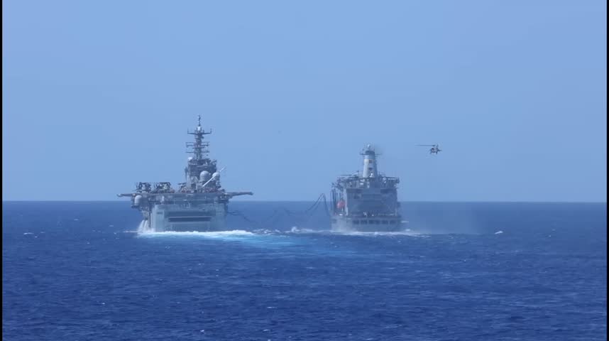 U.S. Marines and Sailors with the 22nd Marine Expeditionary Unit (Special Operations Capable) and the San Antonio-class amphibious transport dock ship USS San Antonio (LPD 17), Iwo Jima Amphibious Ready Group, conduct a replenishment-at-sea as part of Composite Training Unit Exercise, while underway in the Atlantic Ocean, 
Date Taken:	07.01.2025
Location:	US