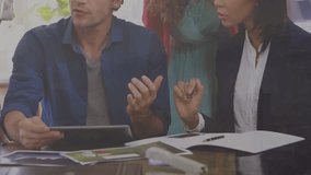 A group of business executives are seen in a meeting discussing financial graphs and data. Global business finances connections and digital interface concept digitally generated video. - Powered by Shutterstock - Get 15% off with code: PIKWIZARD15