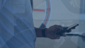 Animation of data processing over businessman using smartphone. Global business and digital interface concept digitally generated video. - Powered by Shutterstock - Get 15% off with code: PIKWIZARD15