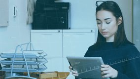 Animation of financial data processing with green line over caucasian businesswoman using tablet. Global business, finances, computing and data processing concept digitally generated video. - Powered by Shutterstock - Get 15% off with code: PIKWIZARD15