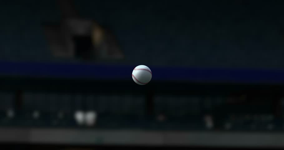 flying baseball ball on stadium