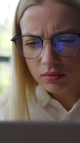 Caucasian business woman ill sick bad vision trying focus on laptop screen with glasses businesswoman with terrible eyeglasses blurry eyesight female girl computer overwork eyes irritation in office
