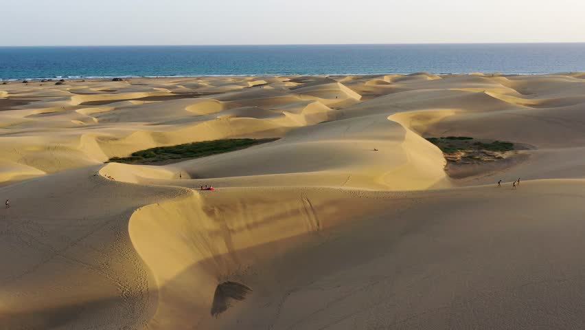 Landscape with Maspalomas town and golden sand dunes, Gran Canaria, Canary Islands, Spain. Natural Reserve of Dunes of Maspalomas, in Gran Canaria, Canary Islands, Spain.