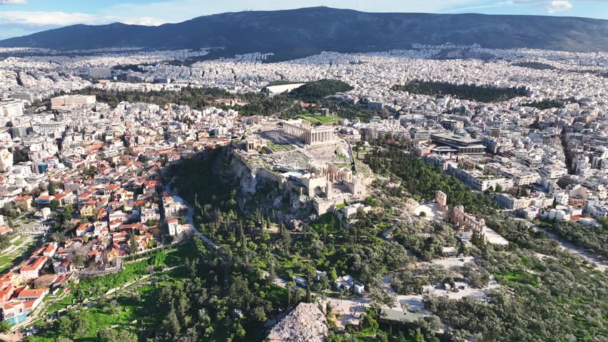 Flying around the Acropolis of Athens, Greece on a sunny day