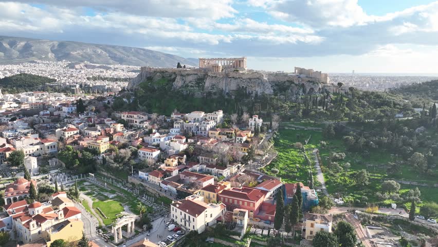 Flying over the Acropolis of Athens, Greece and the old town known as Plaka