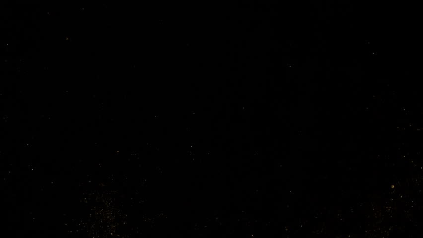 Super Slow Motion Shot of Golden Glitters on Black Background at 1000fps.