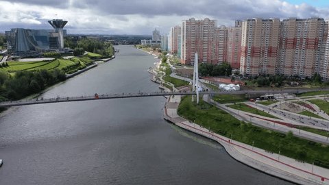 Drone Flying toward Pavshinsky Bridge Dynamic Downward