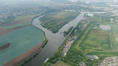 Drone Lowering over River Valley Landscape