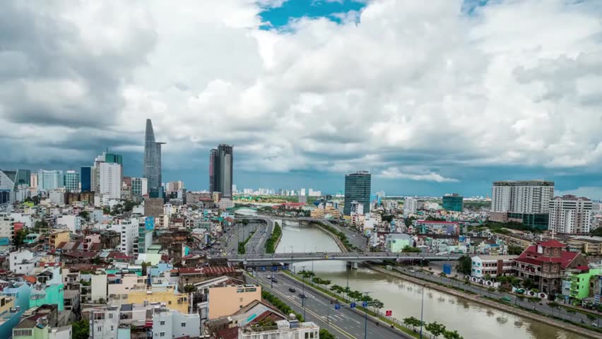 Panoramic view of Saigon, Vietnam, highlighting modern skyscrapers, urban skyline, and vibrant city life, blending tradition and contemporary architecture.