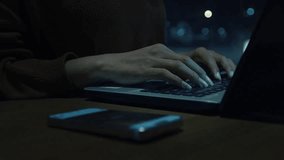 Futuristic hands typing on laptop with hologram data stream and binary code, concept of cyber security, big data analytics, artificial intelligence programming, or internet hacking in the dark. - Powered by Shutterstock - Get 15% off with code: PIKWIZARD15