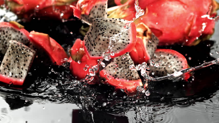 Super slow motion pieces dragon fruit . Filmed on a high-speed camera at 1000 fps. High quality FullHD footage