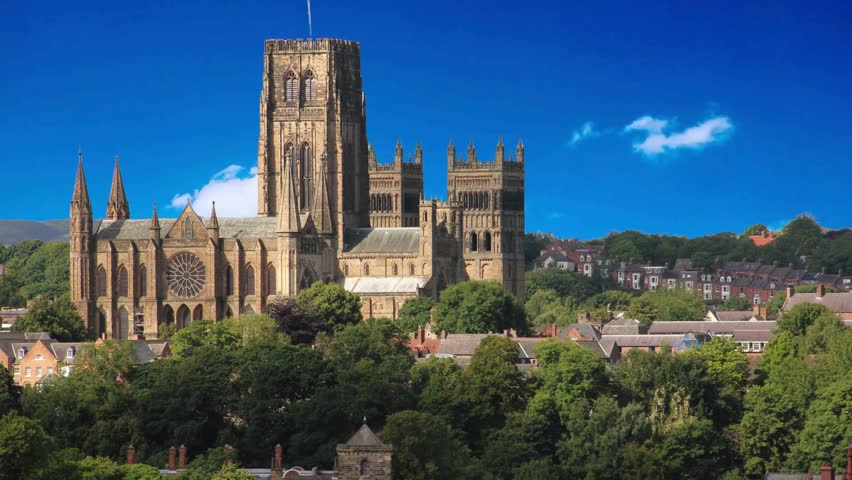 An aerial view of the Durham Cathedral, castle in Durham, UKAn aerial view of the  Cathedral, castle in Durham, UKDurham Cathedral Towers Over The River WearCloisters and interior lawn of , UKworship, tourist attraction, gothic architecture, christian, landmarks, trees, beautiful, uk, historic building, weather, cityscape, prince bishops, tourist destination, ancient, st cuthbert, panorama, background, silhouette, autumn, skyline, historic buildings, vacation, autumn leaves, durham castle, travel destination,, religion, ,  city, medieval, england, architecture, europe, landmark, building, tourism, county  river,  blue sky, landscape, fortification, autumn landscape, elevated view, hill, outdoor, norman, northeast, united kingdom, golden light
