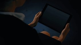 Pink hearts floating and globe of network of connections against businesswoman using digital tablet. Business technology concept - Powered by Shutterstock - Get 15% off with code: PIKWIZARD15