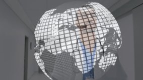 Spinning globe and binary coding over caucasian male doctor walking in hospital corridor. Medical healthcare and technology concept - Powered by Shutterstock - Get 15% off with code: PIKWIZARD15