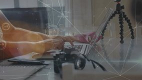 Animation of data processing over caucasian woman using laptop. Lifestyle and digital interface concept digitally generated video. - Powered by Shutterstock - Get 15% off with code: PIKWIZARD15